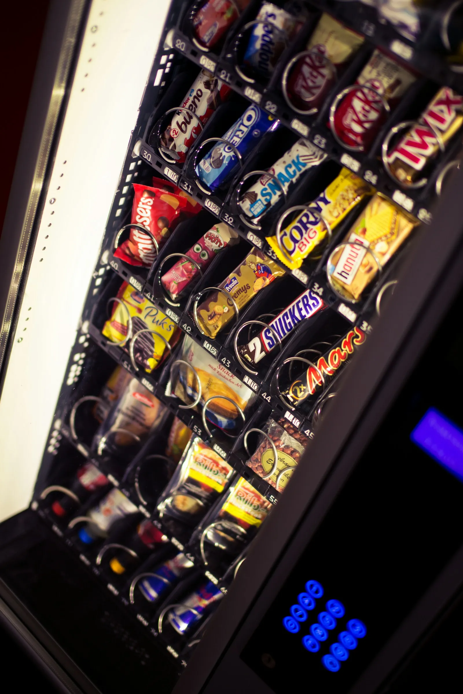 Chocolate bars in the coils of a vending machine