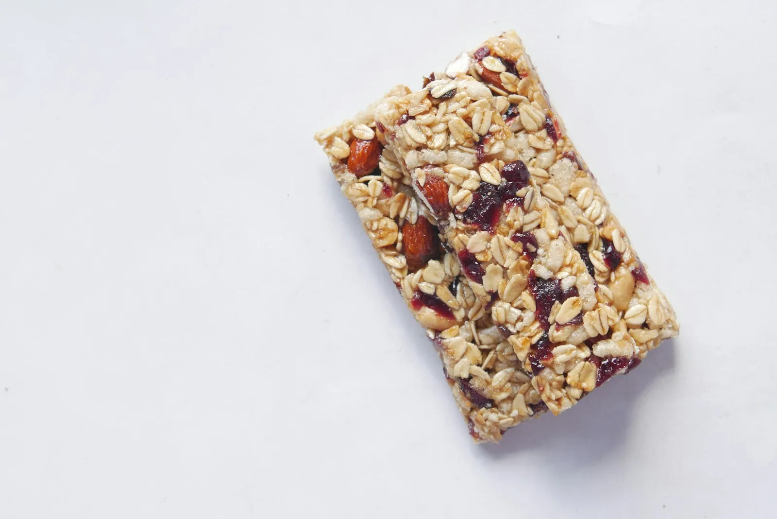A granola bar with nuts and fruit